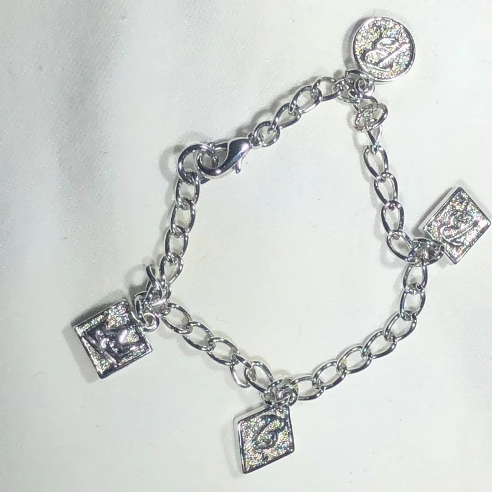 SILVER TONE BARBIE CHARM BRACELET